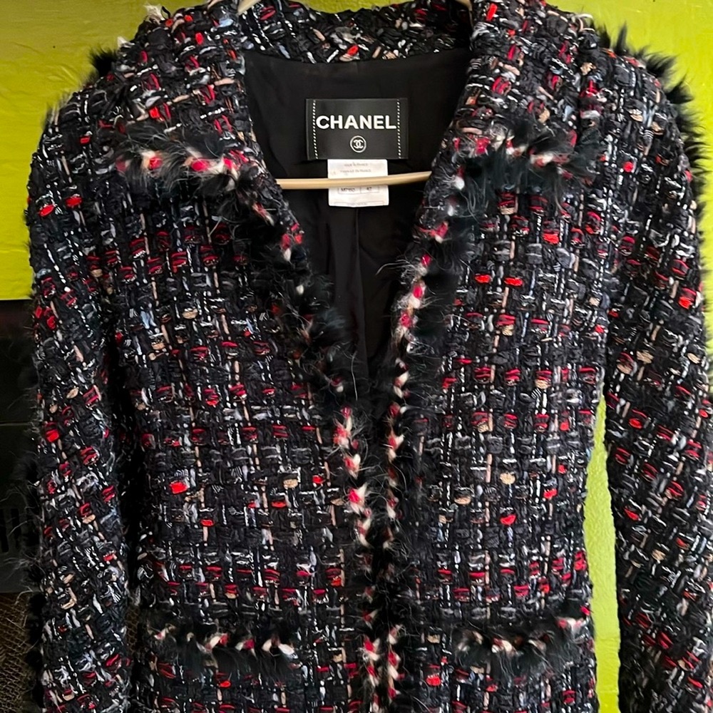 Chanel tweed jacket (black and white with speckles of red), never worn